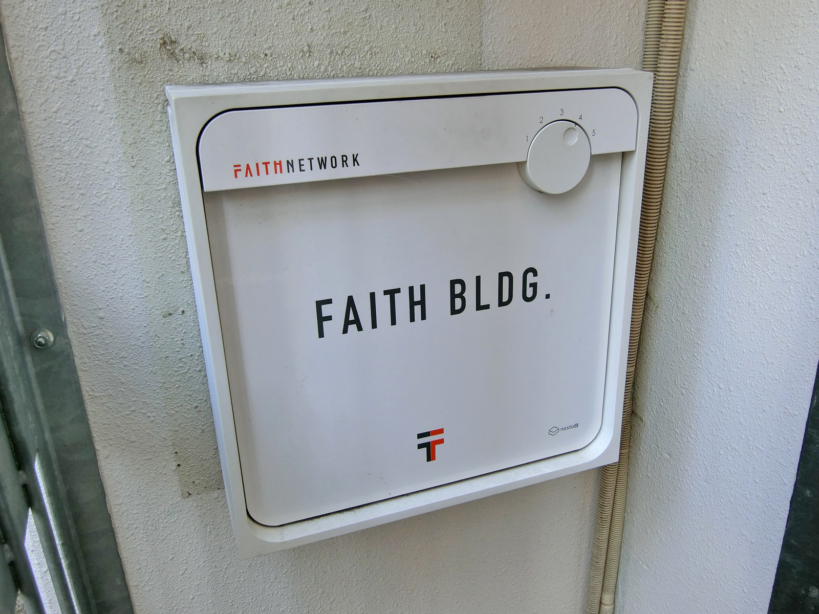 ネームプレート：FAITHビル